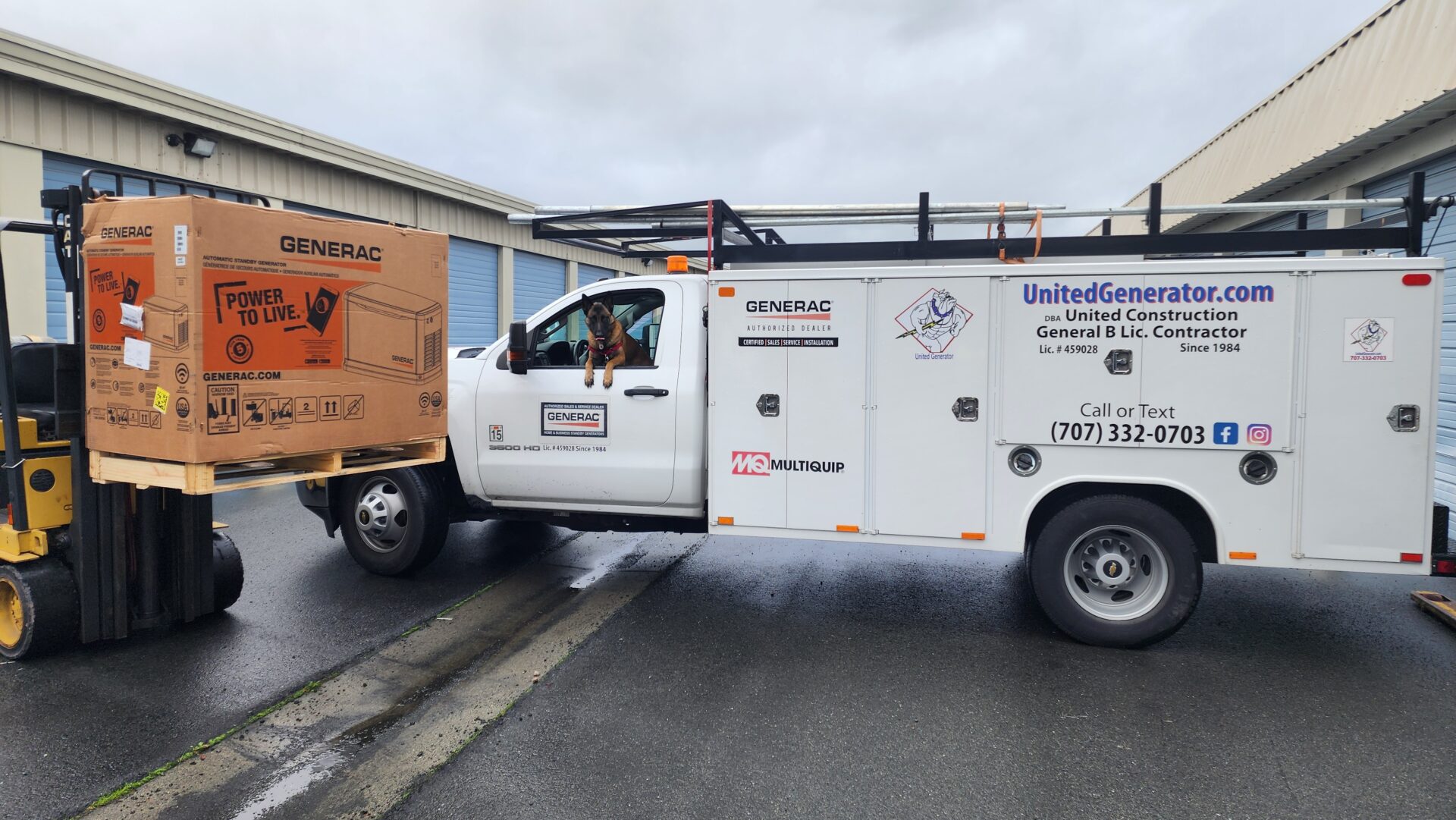 White service van parked on a street near a brown truck.